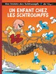 LES SCHTROUMPFS LOMBARD - TOME 25 - UN ENFANT CHEZ LES SCHTROUMPFS